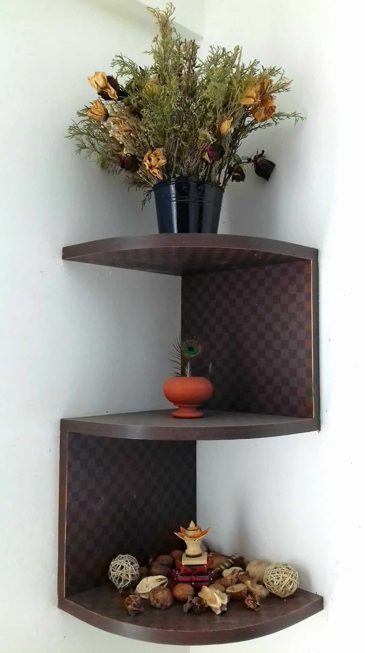 corner shelf with plant and decor