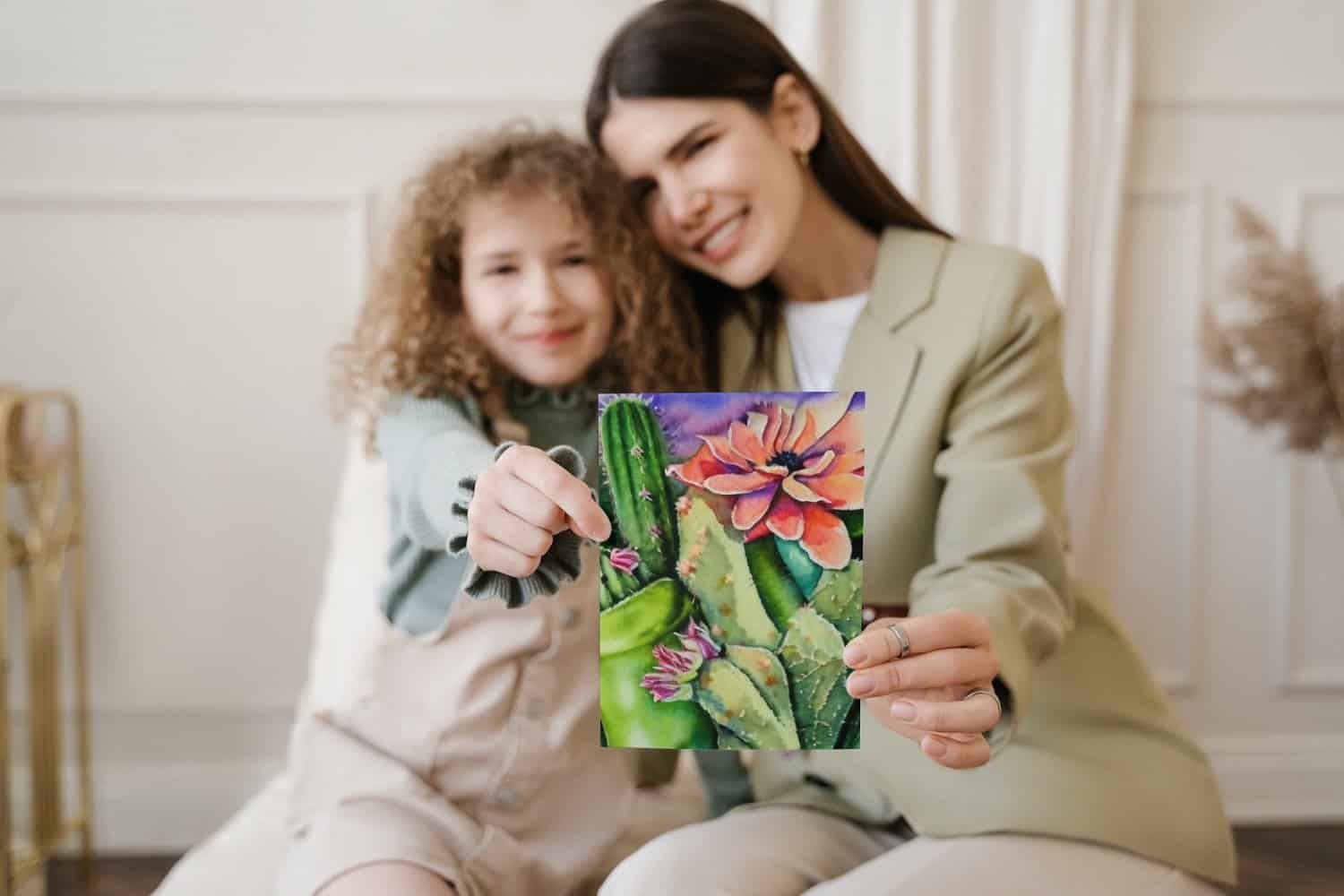 mother and daughter holding a succulent greeting card